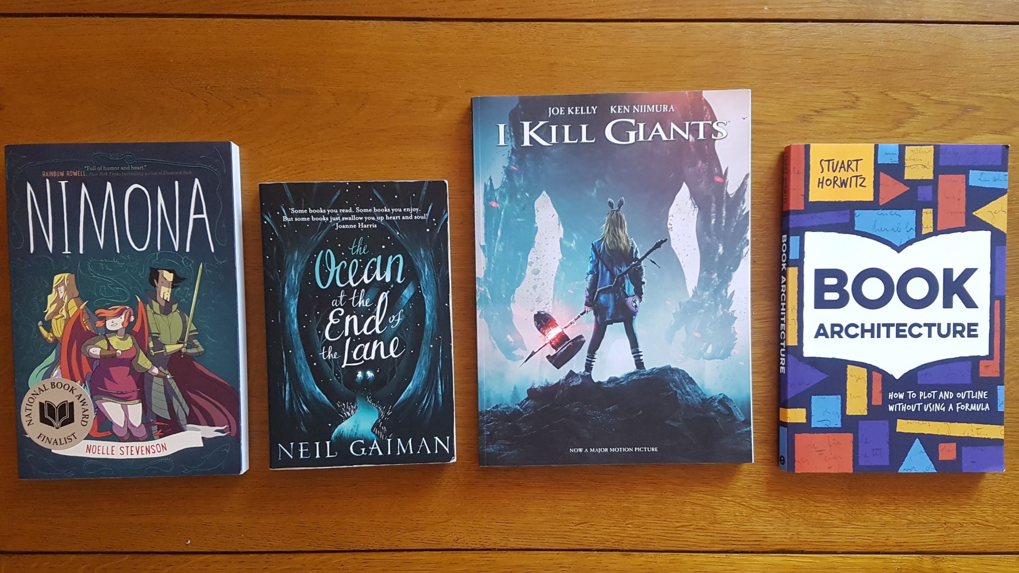 Nimona by Noelle Stevenson, Ocean at the End of the Lane by Neil Gaiman, I Kill Giants by Joe Kelly, Book Architecture by Stuart Horwitz.