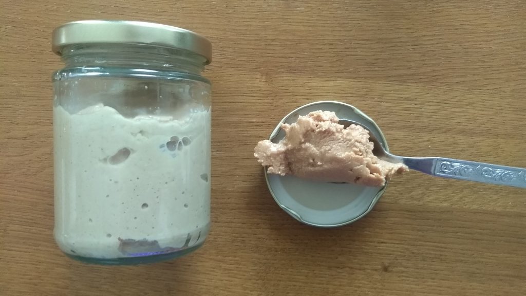 Jar of peanut butter and spoon